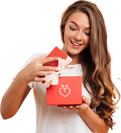 Woman opens a berry gift